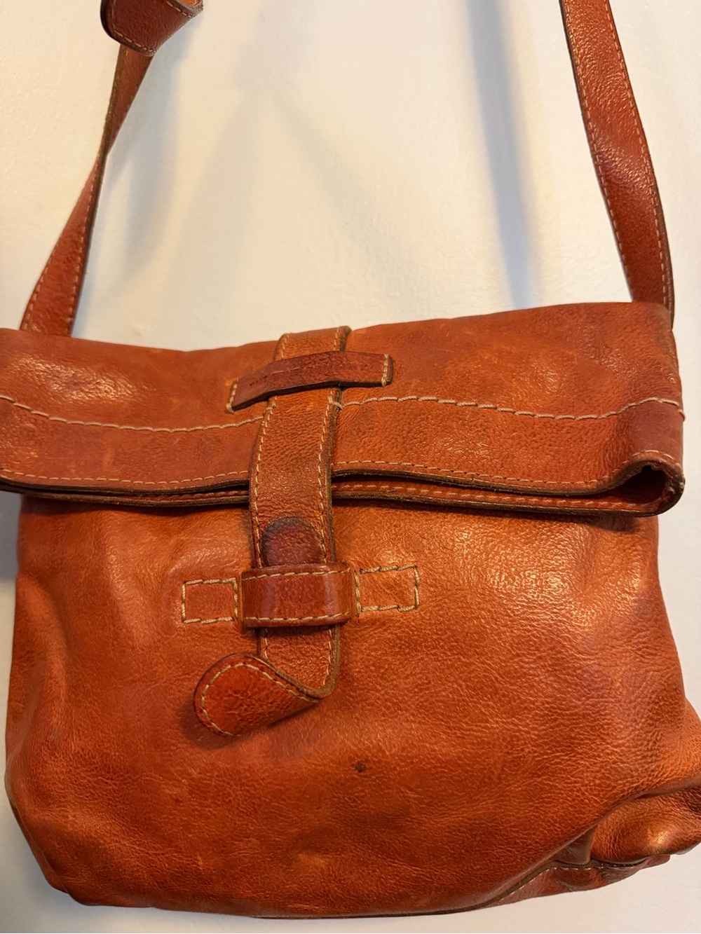 Vintage Frye Distressed Cognac Leather Messenger Bag. Bag rehabbers dream.